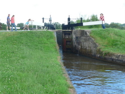 Operating a canal lock.