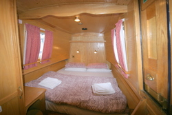 The double bed on all our canal boats.